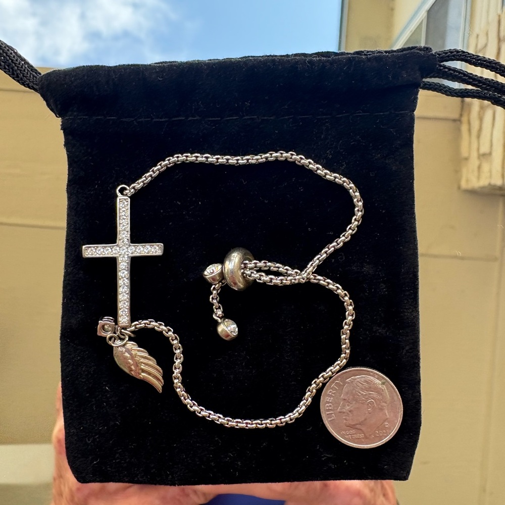 Beautiful and Unique Silver Charm Bracelet with Cross and wing